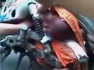 Baby Ripped From Mother's Arms,Gets Caught In Motorbike Wheel