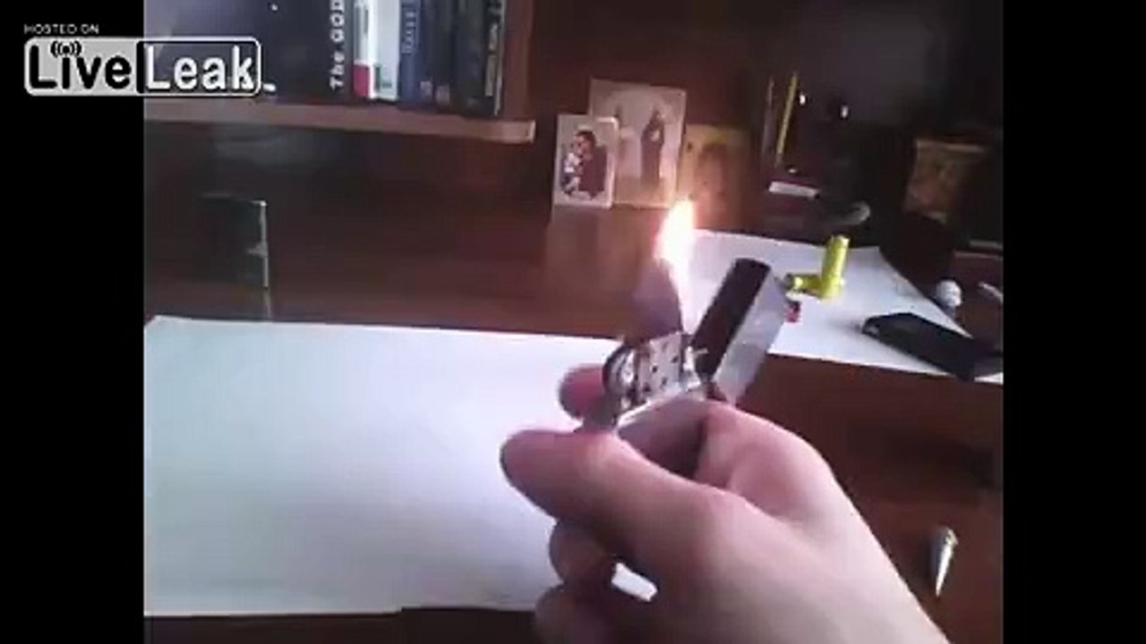 Guy using gasoline to refill a Zippo lighter