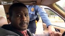 Police officer insists driver exit vehicle but he doesn't comply claiming he feared being the next Mike Brown