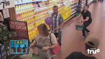 Two try to pin the most balloons on shoppers without them noticing