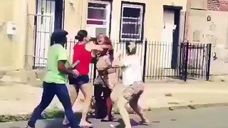 Woman hits another woman, WITH HER DOG!