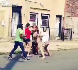 Woman hits another woman, WITH HER DOG!