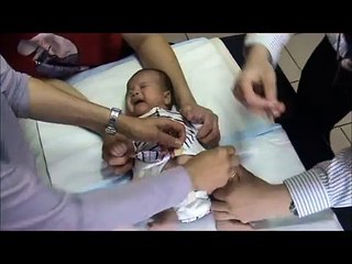 Baby Mason Looi getting first injection by Matu!