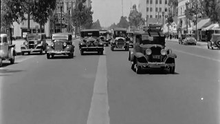 A Dashcam Footage Showing Classic Vehicles on the Street of Beverly Hills, California in the 1930s