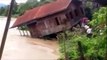 Home fall into river in extreme flash flooding in Myanmar