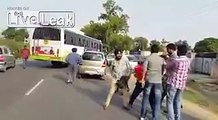 Road Rage in India, Bus Driver and Conductor is Beating a Boy Who was not Giving side to Cross the Bus