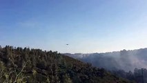 Aircraft Makes Drop on Wildfire Near Cascais Homes