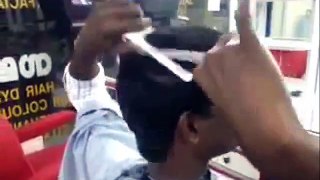 Man Cuts Own Hair