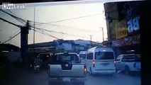 Bus rolls over motorcyclists head.