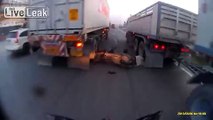 Scooter Rider Is Unbelievably Lucky To Be Alive After Falling Between 2 Trucks!