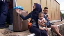 Hongrie : des migrants syriens, expulsés d'un train, refusent d'être emmenés par la police