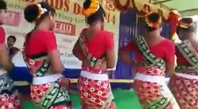 Tribal children playing music for tribal children to dance Dhemsa at Koraput
