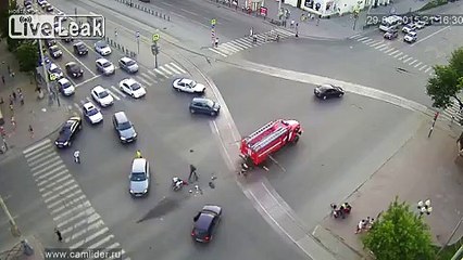 Scooter vs Fire truck crash at intersection