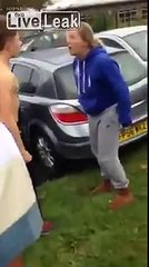 woman breaks up fight between two boys.