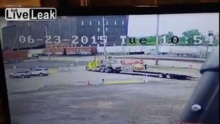 Truck hit by train explodes