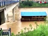 Ship hits bridge and then swept away by flood