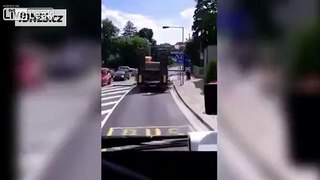 Driver completely misjudges the height of his truck