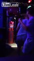 Drunk Guy Tries To Impress Girl By Kicking The Punch Meter