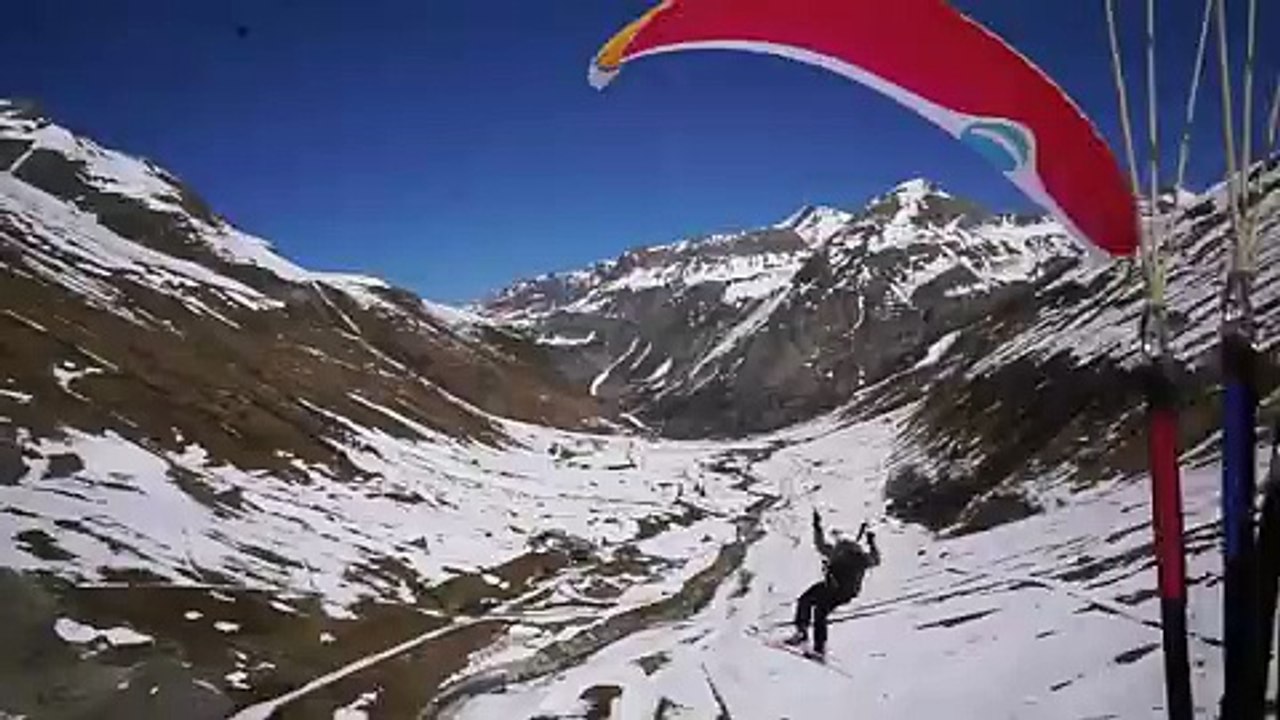 Snow Sports Enthusiasts Try Some Summer Paragliding