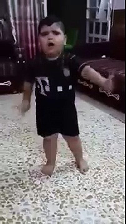 Iraqi Boy singing and dancing