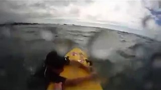 British lifeguard saves boy from drowning.
