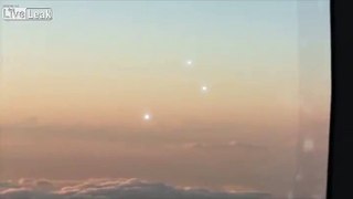 Passenger Films Flying Orbs From Airplane