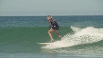 Surfer Woman surfs in High Heels like it's normal!!
