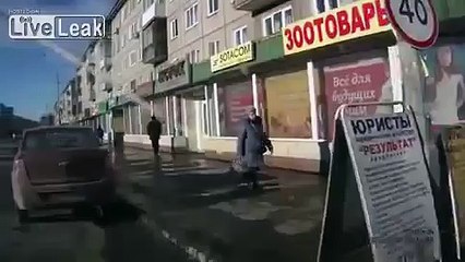 Pedestrian crossing road throws beer bottle at approaching car