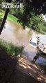 Guy sinks car in the lake trying to put the boat in the water