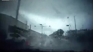 Car hit by twister get's sucked away