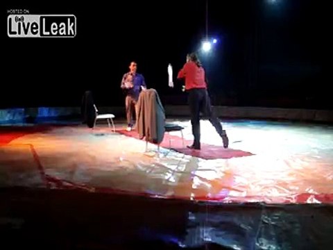 Twin brothers juggling while they swap clothes with eachother.