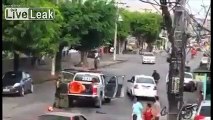 On-Duty Brazilian Cop Beats Deranged Man up With a Metal Bar after the Guy Hit him with a...Traffic Cone