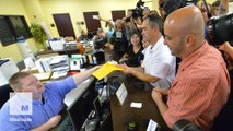 Defiant Kentucky county issues first same-sex marriage license
