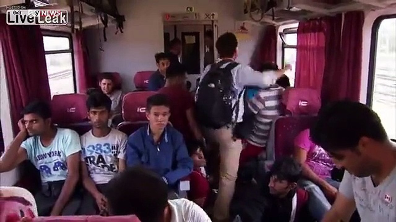 Desperate Migrants Shout 'No Camp' As Train Stopped By Riot Police