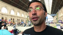 Migrants in Budapest train station fear being tricked by police