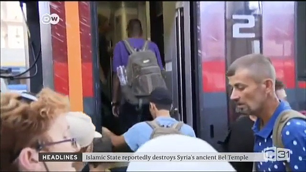 DW News. Merkel Allows All Syrian Refugees Into Germany. Refugees Rarely Go Home!