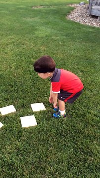 Toddler does mini-adventure parkour in backyard - American Ninja Warrior course