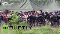 Hungary: Riot police use tear gas as refugees attempt to break out of detention camp