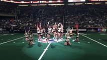 Burly Football Player Crashes Cheerleaders' Routine And Steals The Show