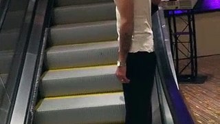 Drunk Guy Rides The World's Longest Escalator
