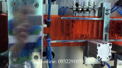 Máy chiết, ép vỉ siro, thuốc nước, dung dịch 5 vòi và dán nhãn tự động