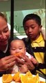 Cassidy's 1st tine to eat oranges @ chinatown downtown montreal Quebec canada