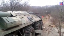 Novorossyia BTR-80 fire on Ukrainian army positions...