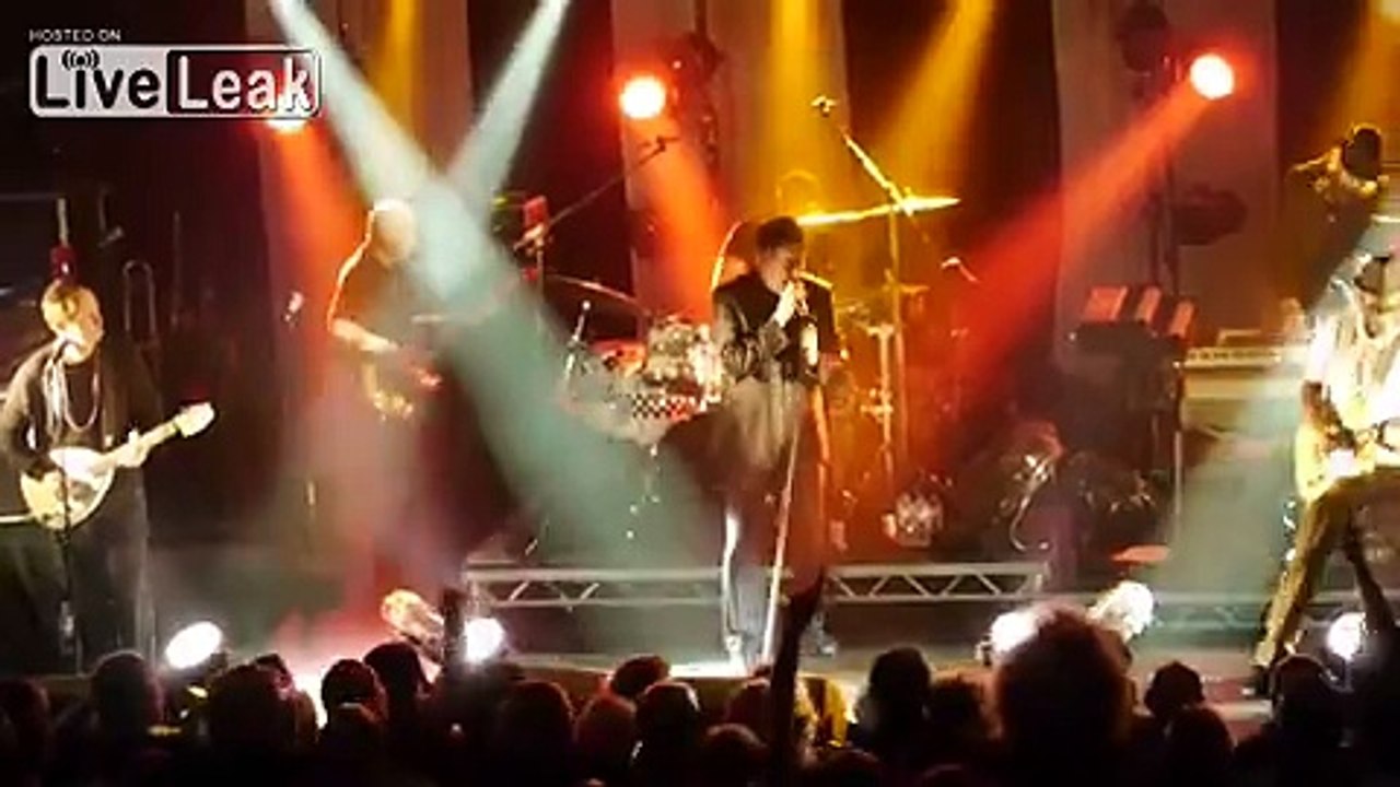 Terry Hall of The Specials deals with can throwing prick