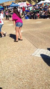 Police officers on duty dancing in public (guns in holster)