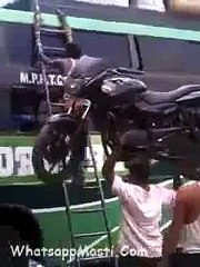 Balancing Stunt - A Guy Uploading The Bike(pulsar) On Head