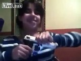 12 yr old girl playing with gun...oops