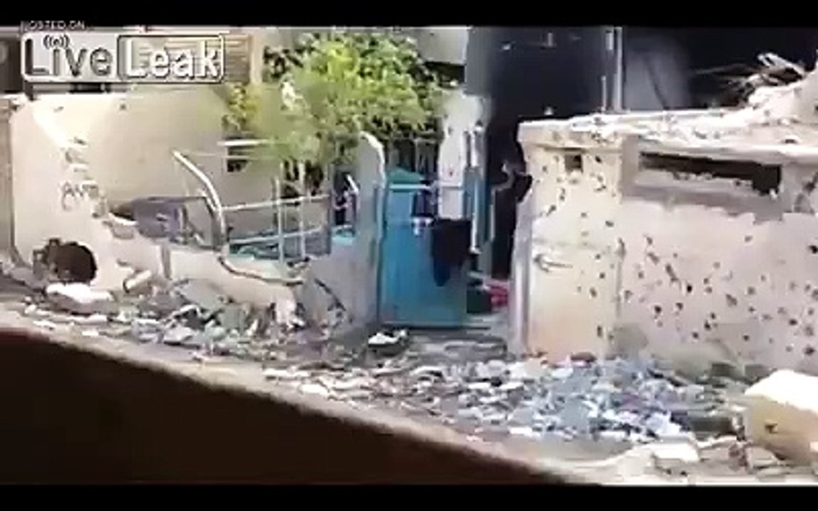 Iraqi s.o.f soldiers playing with IS sniper in al ramadi