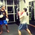 Boxing girl doing focus mitts (its pad time)