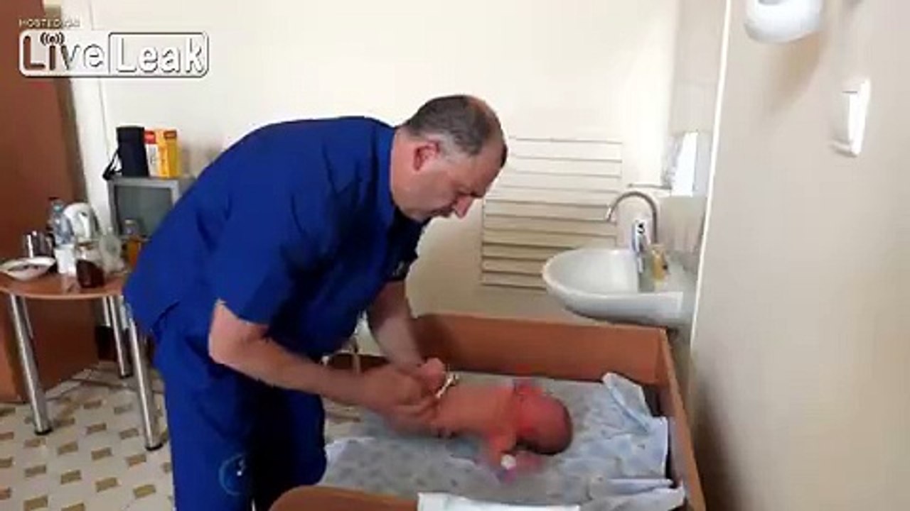 Russian Orthopedic examination of a very young baby.
